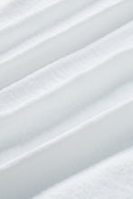 Load image into Gallery viewer, White Smocked Wrist Shift Top