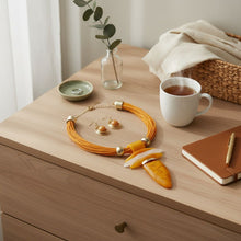 Load image into Gallery viewer, Orange Marbled Horn Pendant Multi Cord Necklace