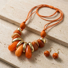 Load image into Gallery viewer, Orange & Gold Resin Teardrop Cord Tribal Necklace