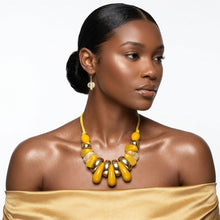 Load image into Gallery viewer, Yellow & Gold Resin Teardrop Cord Tribal Necklace