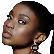 Load image into Gallery viewer, Black Bee Charm Twisted Gold Hoops