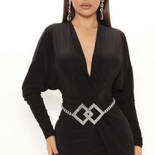 Load image into Gallery viewer, Model wearing the silver rhinestone diamond chain belt with a black plunge dress