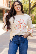 Load image into Gallery viewer, Beige Flower Patch Graphic Exposed Seam Wide Sleeve Top
