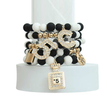 Load image into Gallery viewer, Matte Black and White Boutique Charm Bracelets
