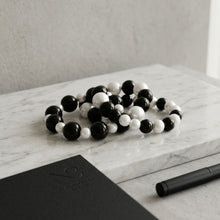 Load image into Gallery viewer, Black Bead White Pearl Bracelet Stretch 3 Strand

