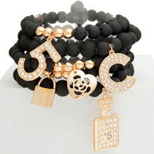 Load image into Gallery viewer, Matte Black Boutique &amp; No.5 Charm Bracelets
