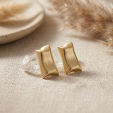 Load image into Gallery viewer, Stud Matte Gold Bent Rectangle Domed Earrings
