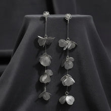 Load image into Gallery viewer, Long Dangle Silver Die Cut Metal Flower Earrings
