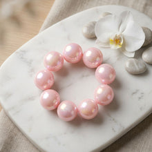 Load image into Gallery viewer, High Gloss Pearlescent Pink 24mm Bead Bracelet
