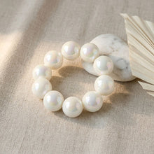 Load image into Gallery viewer, High Gloss Pearlescent White 24mm Bead Bracelet
