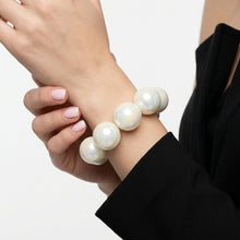 Load image into Gallery viewer, High Gloss Pearlescent White 24mm Bead Bracelet

