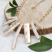 Load image into Gallery viewer, Bib Gold Sculptural Silhouette Glam Bar Necklace

