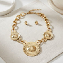 Load image into Gallery viewer, Bib Oversized Gold Sculptural Metal Disc Necklace
