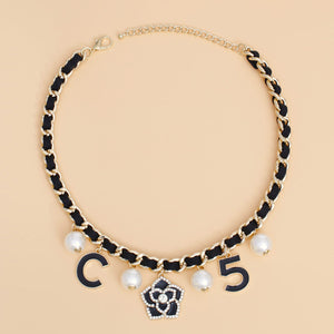 Gilded Glamour: The Camellia Charm Necklace