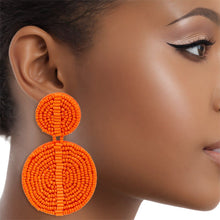 Load image into Gallery viewer, Drop Orange Seed Bead and Felt Circle Earrings
