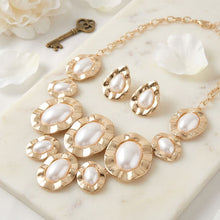 Load image into Gallery viewer, Gold Hammered Oval Pearl Linked Bib Necklace
