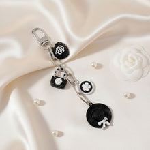 Load image into Gallery viewer, Keychain Black and White Camellia Charms Bag Clip
