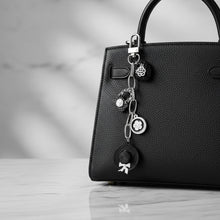 Load image into Gallery viewer, Keychain Black and White Camellia Charms Bag Clip
