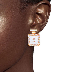 Glamorous Trio: Gold and White Chanel Earrings