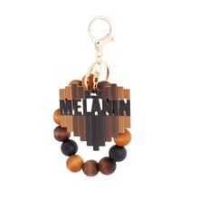 Load image into Gallery viewer, Melanin Wood Bead Keychain
